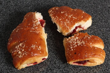 Crescent shaped sweet roll with jam