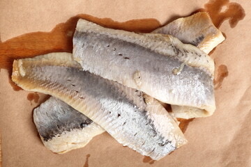 Pickled herring. Salted, soused skinless fillets of fish Clupea.