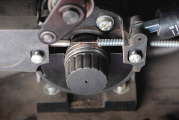 Pressure roller of the semi automatic welding machine close up.