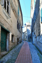 A narrow street among the old houses of Pofi, a medieval town in the Lazio state, province of Frosinone in Italy.