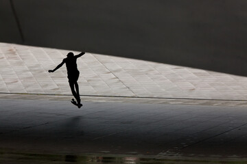 Skateboarders in underpass, Singapore, SE Asia