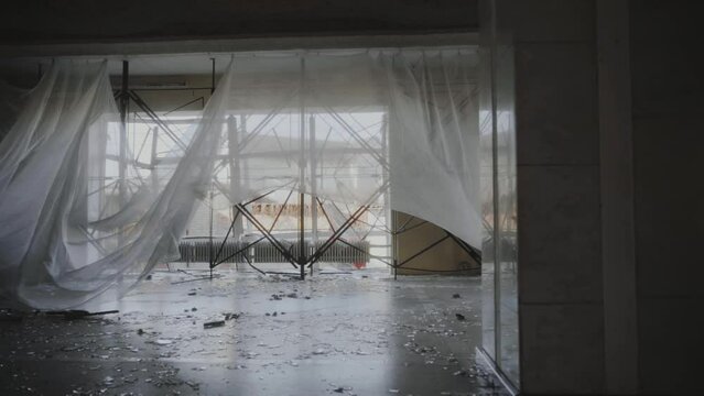Destroyed house of culture, broken windows as a result of bombings. 2022