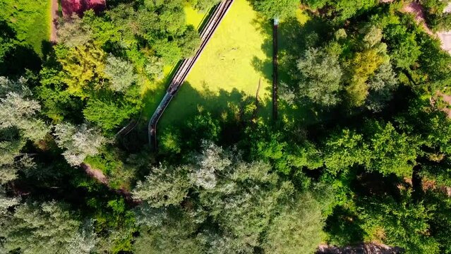 Aerial top down drone view of roller coaster in Spreepark Berlin