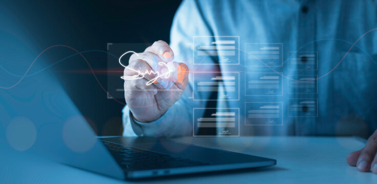 Electronic signature, e-document management Paperless workplace, e-signing, document management man signs an electronic document on a digital document on a virtual notebook screen using a stylus pen