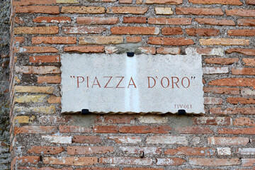stone tablet with inscription " piazza d'oro" in archaeological roman ruins of Villa Adriana (Hadrian's Villa) in Tivoli, neighborhood of Rome, Italy