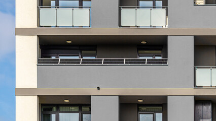 Solar panels on balcony of modern apartment building. Green energy produced for eco flat. 