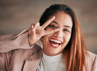 Portrait, smile and woman with peace sign, excited and happiness with joy, carefree and cheerful....