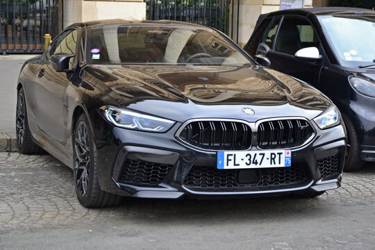 Paris, France - February 4, 2020: Focus on a black BMW M5 Competition parked in front of the Automobile club de Paris.