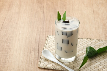 Es Cincau or Grass jelly with almond milk in glass

