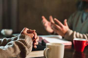 Small group of asian people praying worship believe. Teams of friends worship together before...