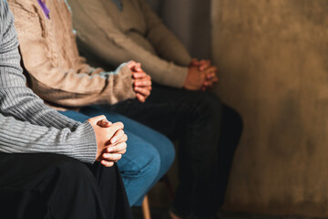 Small group of asian people praying worship believe. Teams of friends worship together before studying Holy bible. family praying together in church. Small group learning with prayer concept.