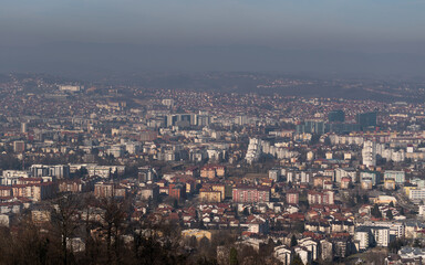 Obraz premium Cityscape of Banja Luka city during sunny day with haze in air