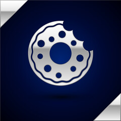 Silver Donut with sweet glaze icon isolated on dark blue background. Vector