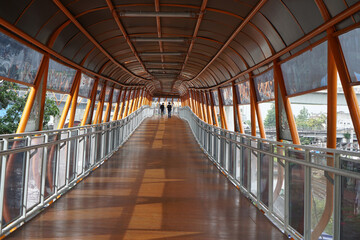 Skywalk or pedestrian bridge that connects the Commuterline Station and Transjakarta bus stop.    
