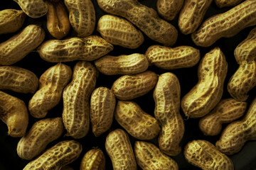 groundnut on black background. peanut shell