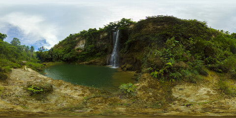 Fototapeta na wymiar Kilab Kilab Falls in green forest. Waterfall in the tropical mountain jungle. Bohol, Philippines. 360 panorama VR.