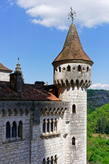 Fototapeta na wymiar Rocamadour, Lot, France - 21th of june 2022 : close-up on one of the city's symbolic towers