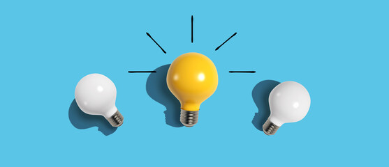 One out unique idea light bulb - Flat lay