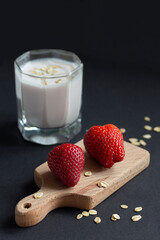 strawberry yogurt strawberries on a wooden board