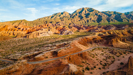 Aerial Drone Above Cafayate Vineyards and Town, Scenic Grape Production Field and Agricultural Village next to Andean Cordillera, Salta, Argentina
