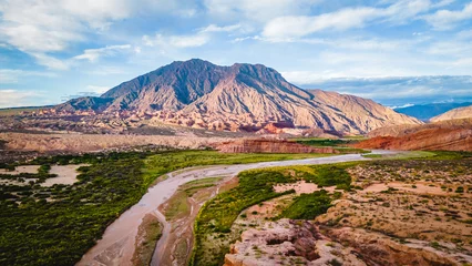 Fotobehang Aerial Drone Above Cafayate Vineyards and Town, Scenic Grape Production Field and Agricultural Village next to Andean Cordillera, Salta, Argentina © Michele