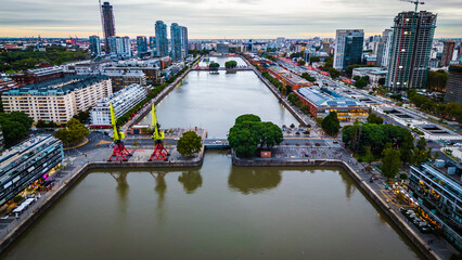 Obraz premium Aerial Drone Above Puerto Madero Skyscrapers and Woman's Bridge Buenos Aires Argentina Commercial District