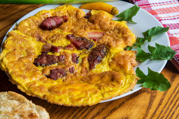 Egg omelette with bacon, traditional morning breakfast...