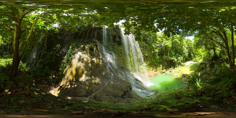 Waterfall in the rainforest jungle. Tropical Kawasan Falls in mountain jungle. Bohol, Philippines....