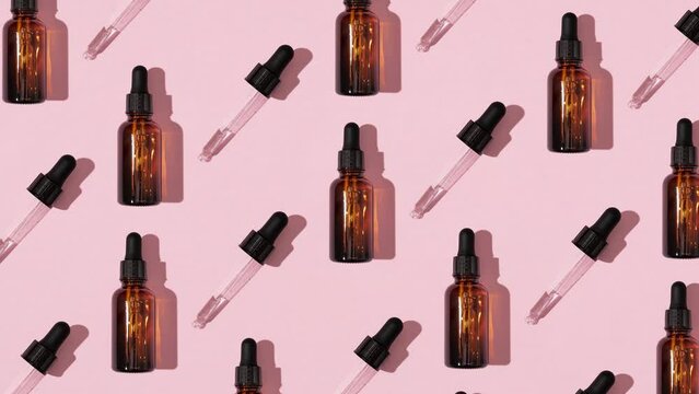 Simple face skincare pattern animation made with dark brown glass serum or essential oil bottle and dropper on pastel pink background. Minimal fresh cosmetic product aesthetic.