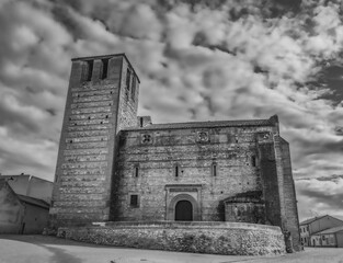 Church of San Miguel in the town of Arevalo. Black and white photograph with clouds in the sky. Castilla y Leon. Spain