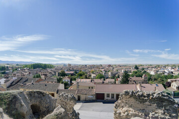 Panoramic view of the medieval village of Turegano on a spring day with blue sky. Segovia. Spain. 