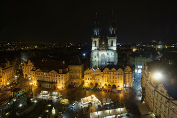 Fototapeta na wymiar Night time panoramic view of the Jan Hus monument and Church of Our Lady before Týn in the Old Town Square of Prague, Czech Republic