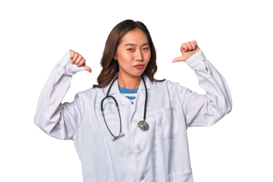 A young asian doctor woman feels proud and self confident, example to follow.
