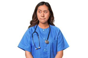 A young nurse chinese woman confused, feels doubtful and unsure.