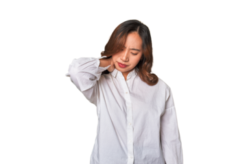 A young chinese woman suffering neck pain due to sedentary lifestyle.