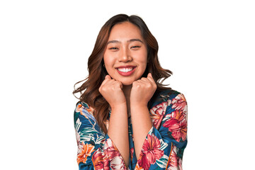 A smiling young Asian woman wearing a kimono, a traditional Japanese garment