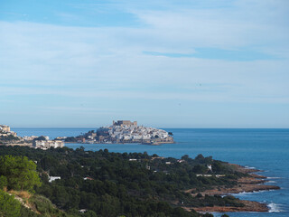 View of the famous Templar and medieval city of Peñíscola with its walls over the sea.