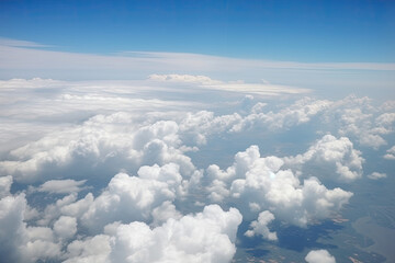 Naklejka na ściany i meble Above the clouds, areal photo of earth
