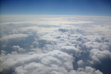 Fototapeta na wymiar Above the clouds, areal photo of earth