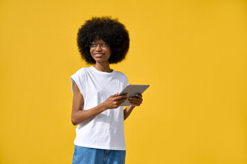 A happy hipster girl with afro haircut enjoy online communication and online services, scroll...