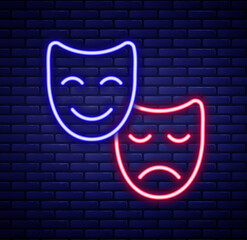 Glowing neon line Comedy and tragedy theatrical masks icon isolated on brick wall background. Colorful outline concept. Vector