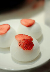 Fresh strawberry vanilla mochi ice cream plate                                                            
