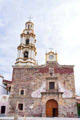 Fototapeta na wymiar san andres apostol church front and bell tower in ajijic mexico