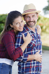 happy couple on the field at property