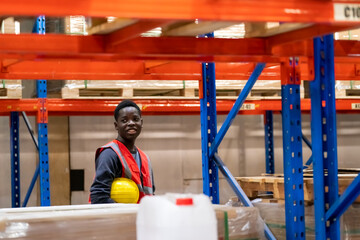 Warehouse workers checking the inventory. Products on inventory shelves storage. .Worker Doing Inventory in Warehouse. Dispatcher in uniform making inventory in storehouse.