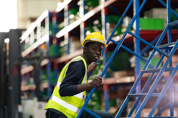 Warehouse workers checking the inventory. Products on inventory shelves storage. .Worker Doing...