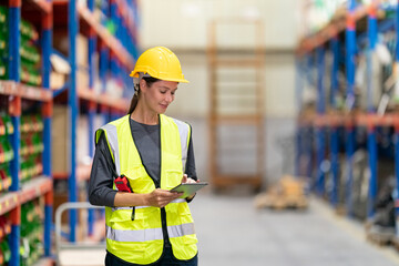 Warehouse workers checking the inventory. Products on inventory shelves storage. .Worker Doing Inventory in Warehouse. Dispatcher in uniform making inventory in storehouse.