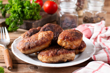 Delicious homemade cutlets in bowl. Chicken cutlets.