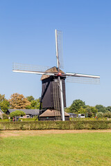 Typical Dutch Doesburger mill in Ede, Gelderland, Holland