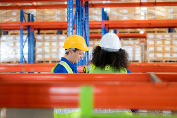 Warehouse workers checking the inventory. Products on inventory shelves storage. .Worker Doing...